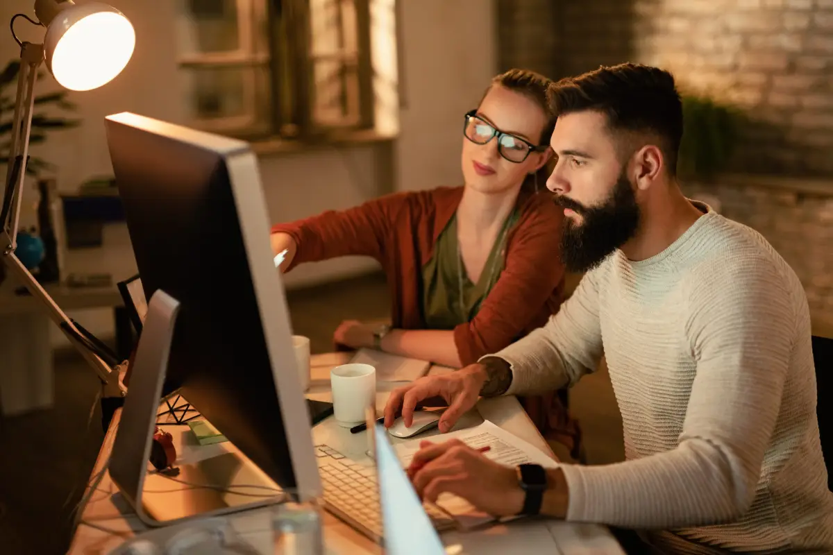 Two developers reviewing a website layout together