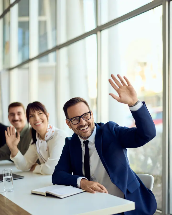 Our team greeting a client in a bright office