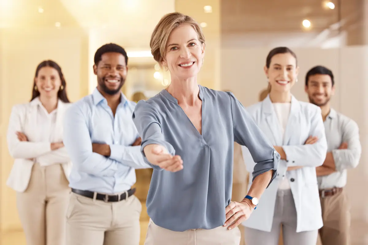 A smiling web design team ready to work